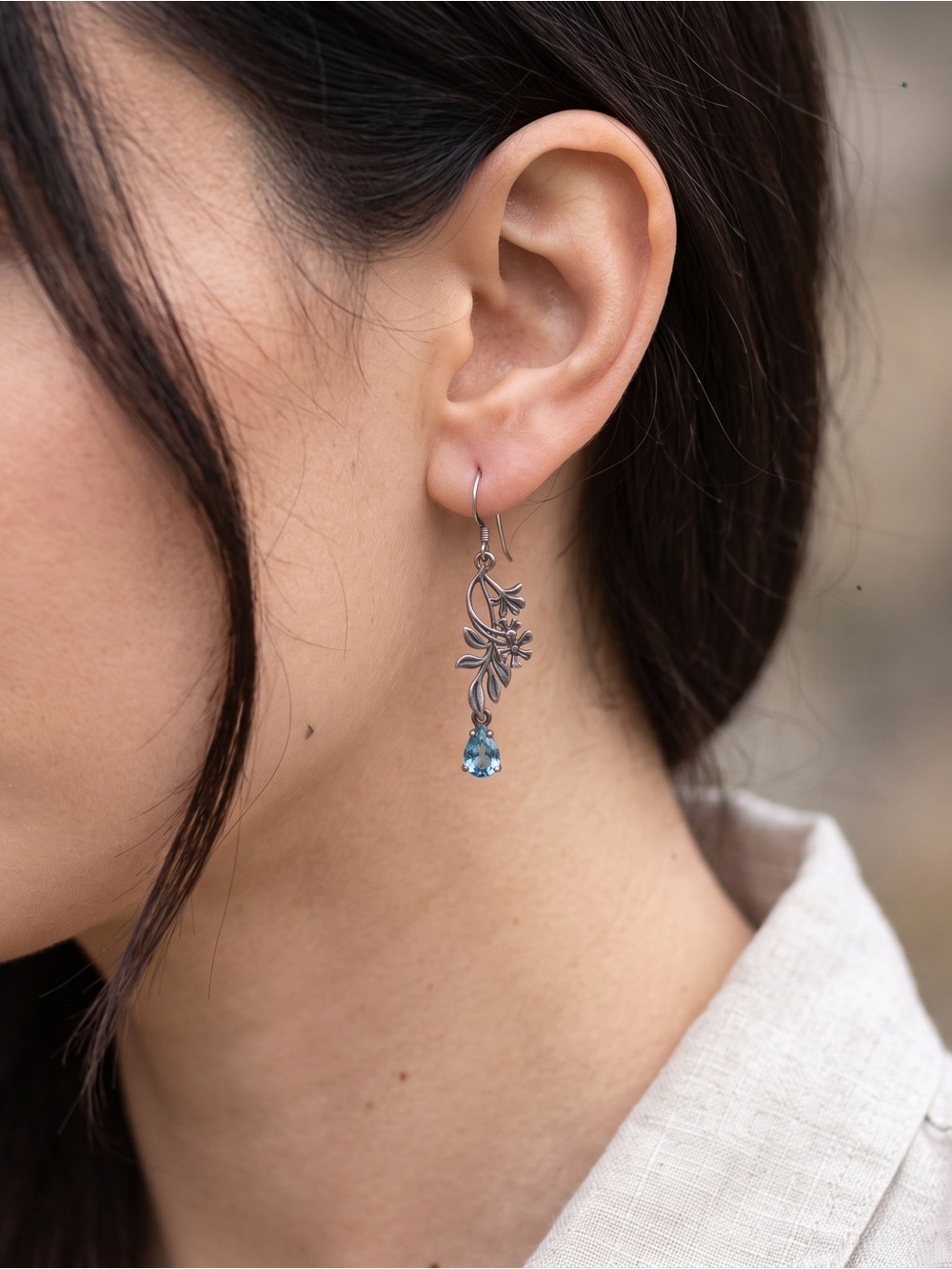 Delicate Floral Drop Earrings with Blue Teardrop Gem